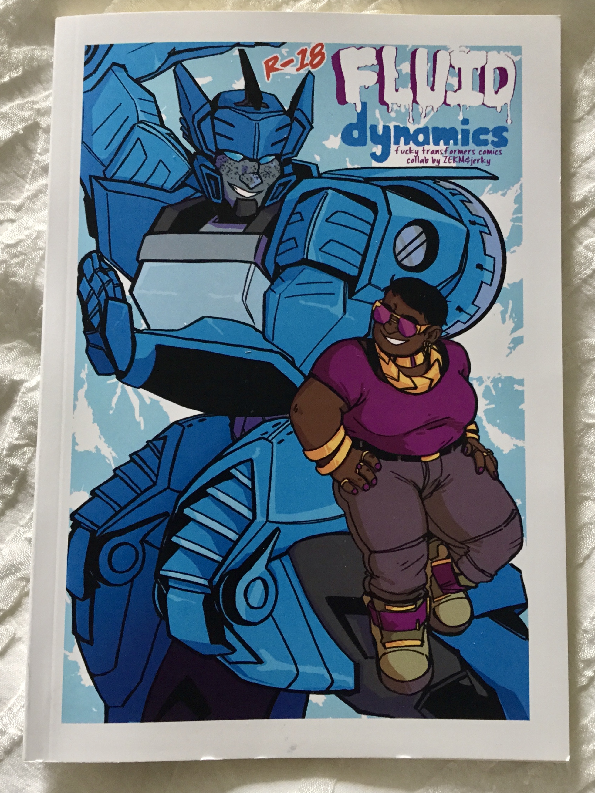 Blurr and human Swindle. Blurr is a blue robot and Swindle is dark skinned in a purple top